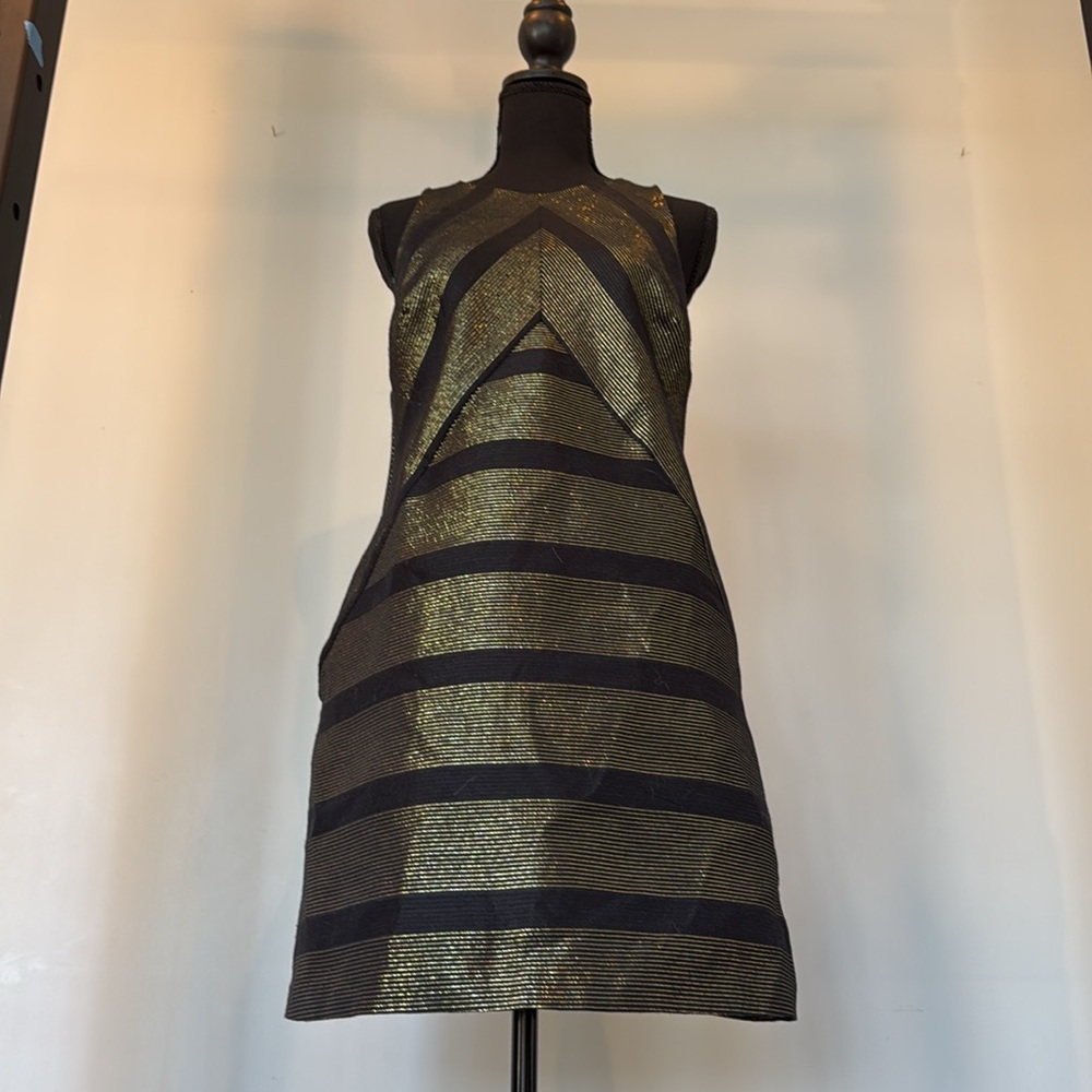 Gold and black striking short dress by Hutch snappy look